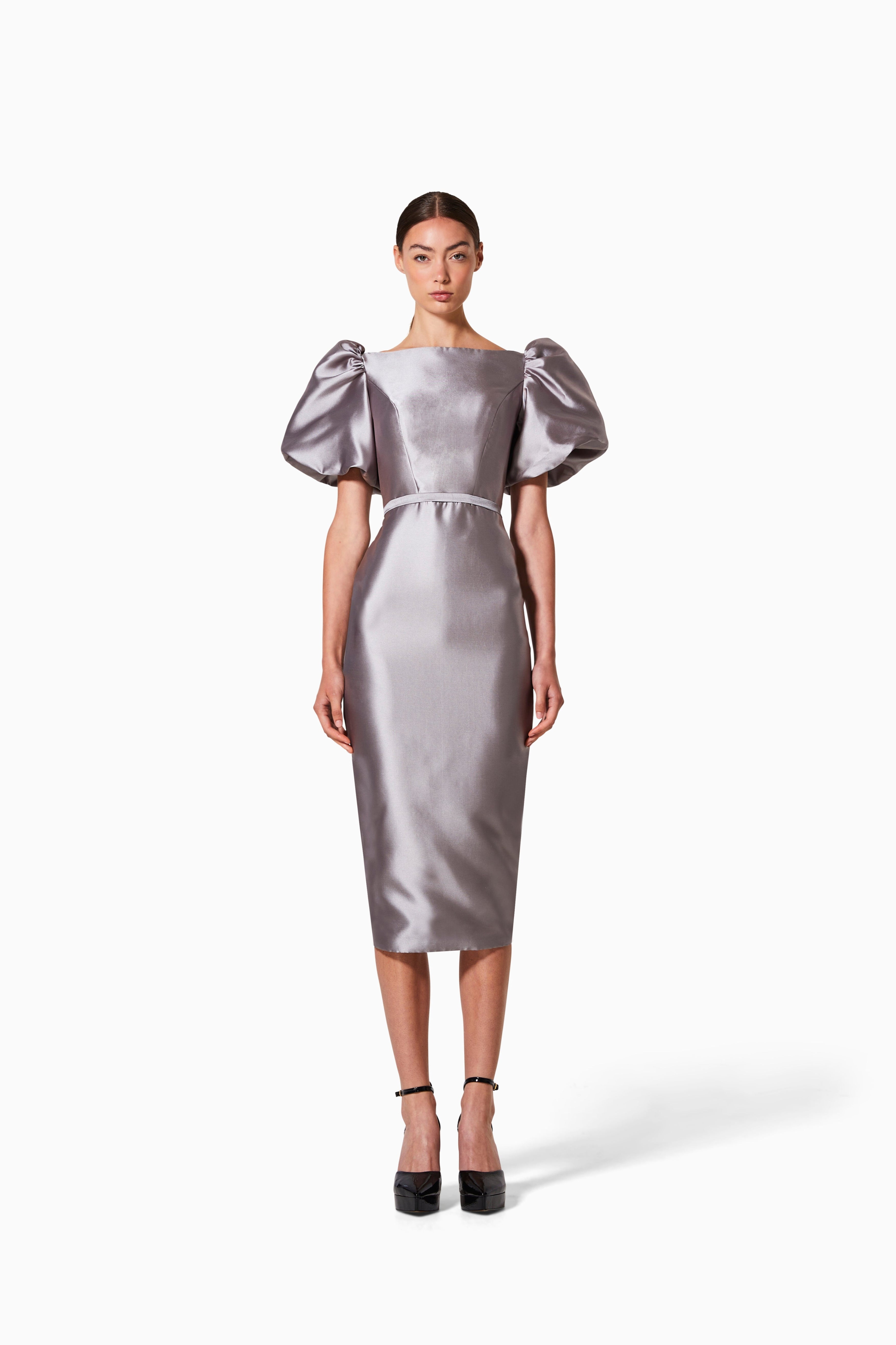 A gray mikado silk dress with a V-neck front and back, featuring tea party sleeves.